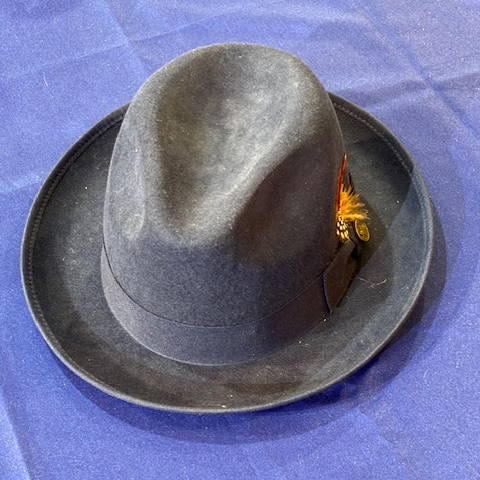 A grey Fedora orange accents