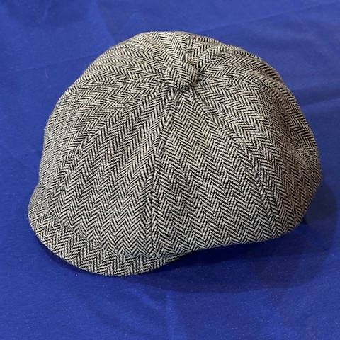 Newsboy hat with brim to the left