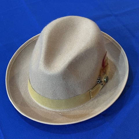 A white fedora with yellow band